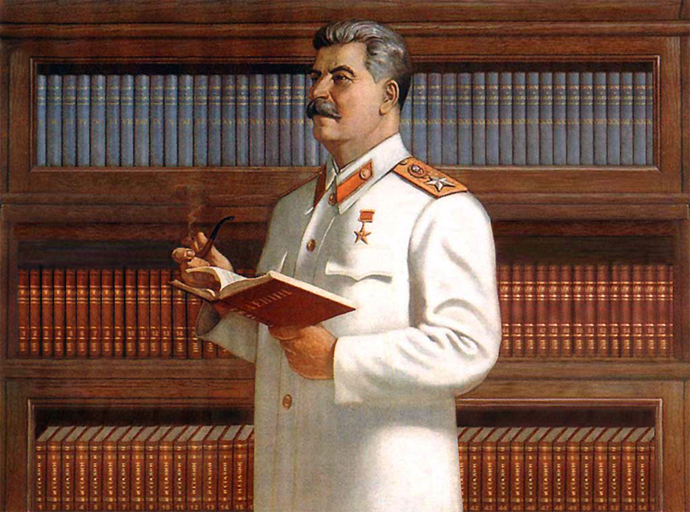 A portrait of Soviet leader Joseph Stalin in his library, <em>c</em>.1943 (photograph via Alamy)
